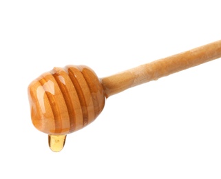 Photo of Honey dripping from dipper on white background