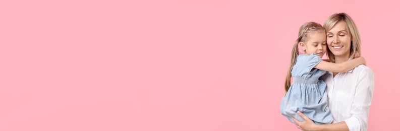 Image of Happy mother and daughter on light pink background, space for text. Banner design