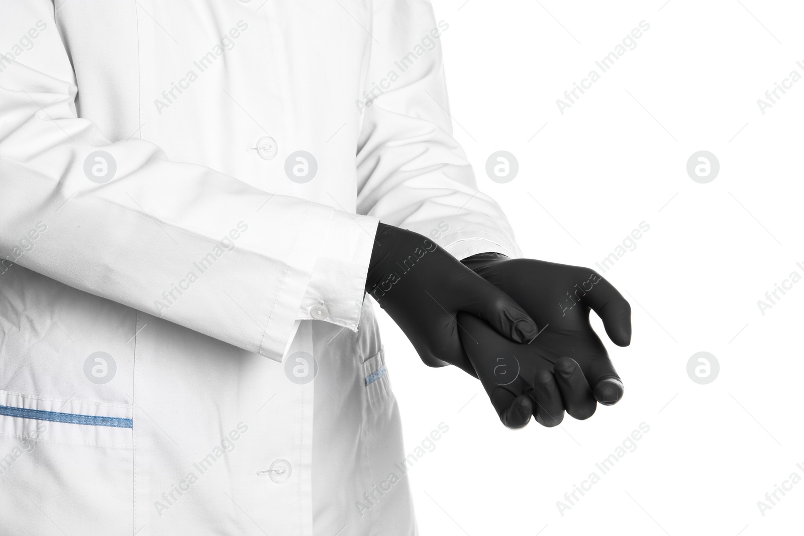 Photo of Doctor wearing medical gloves on white background