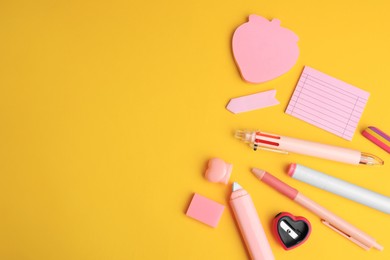 Flat lay composition with different school stationery on yellow background, space for text. Back to school