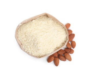 Paper bag with almond flour and nuts isolated on white, top view