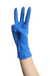 Photo of Woman in blue latex gloves showing three fingers on white background, closeup of hand