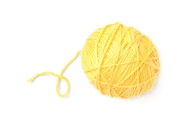 Photo of Soft yellow woolen yarn isolated on white, top view
