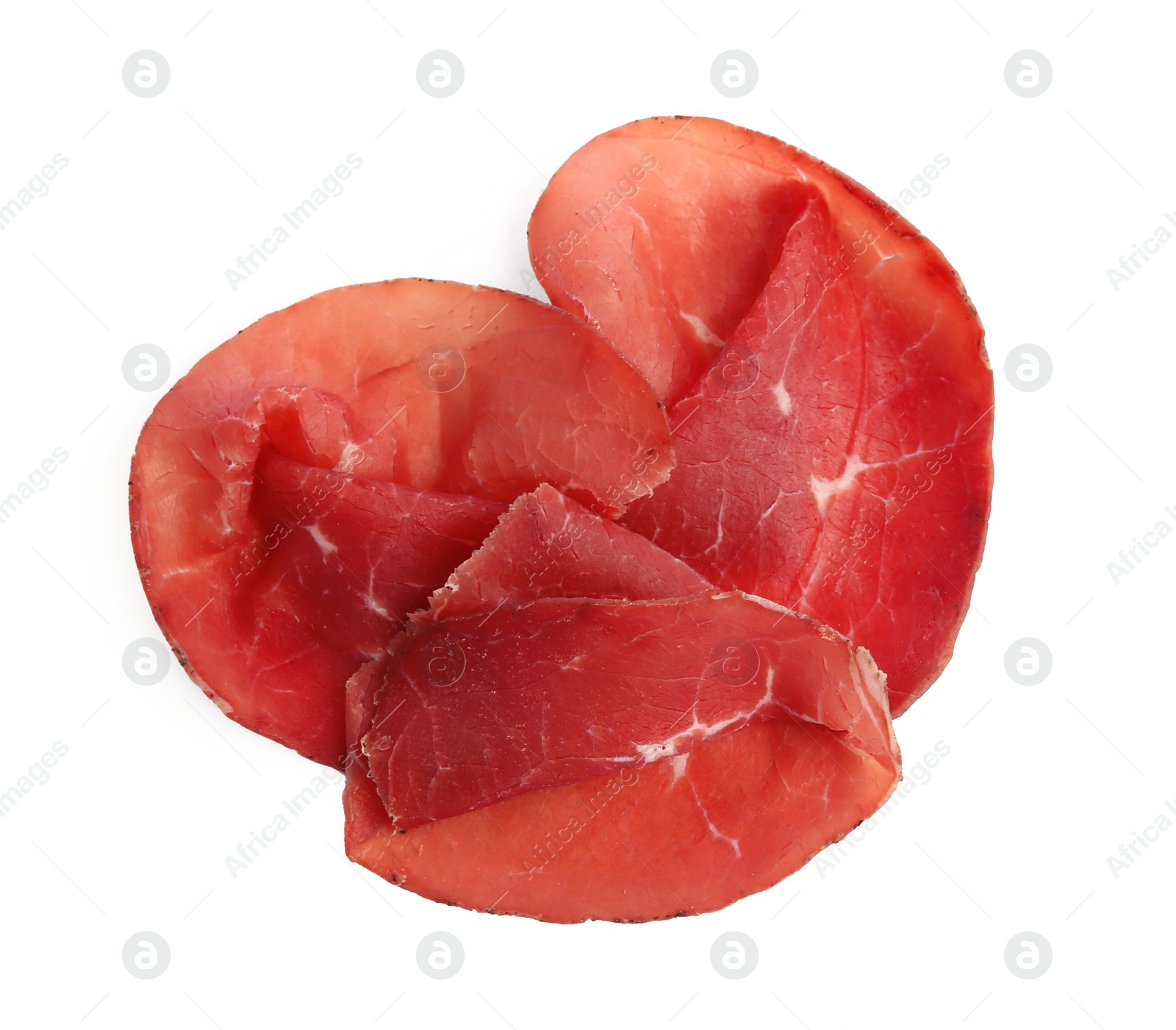 Photo of Slices of tasty bresaola isolated on white, top view