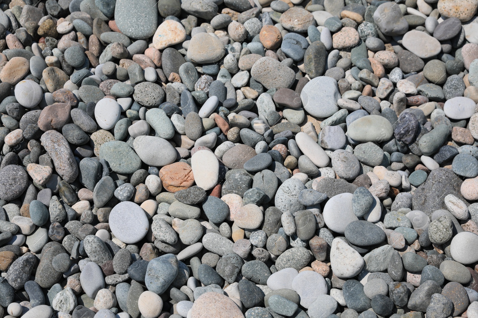 Photo of Many different stones as background, above view