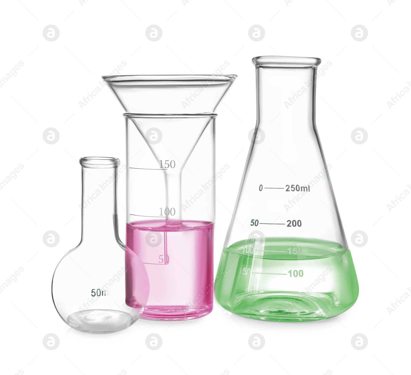 Image of Different laboratory glassware with colorful liquids isolated on white