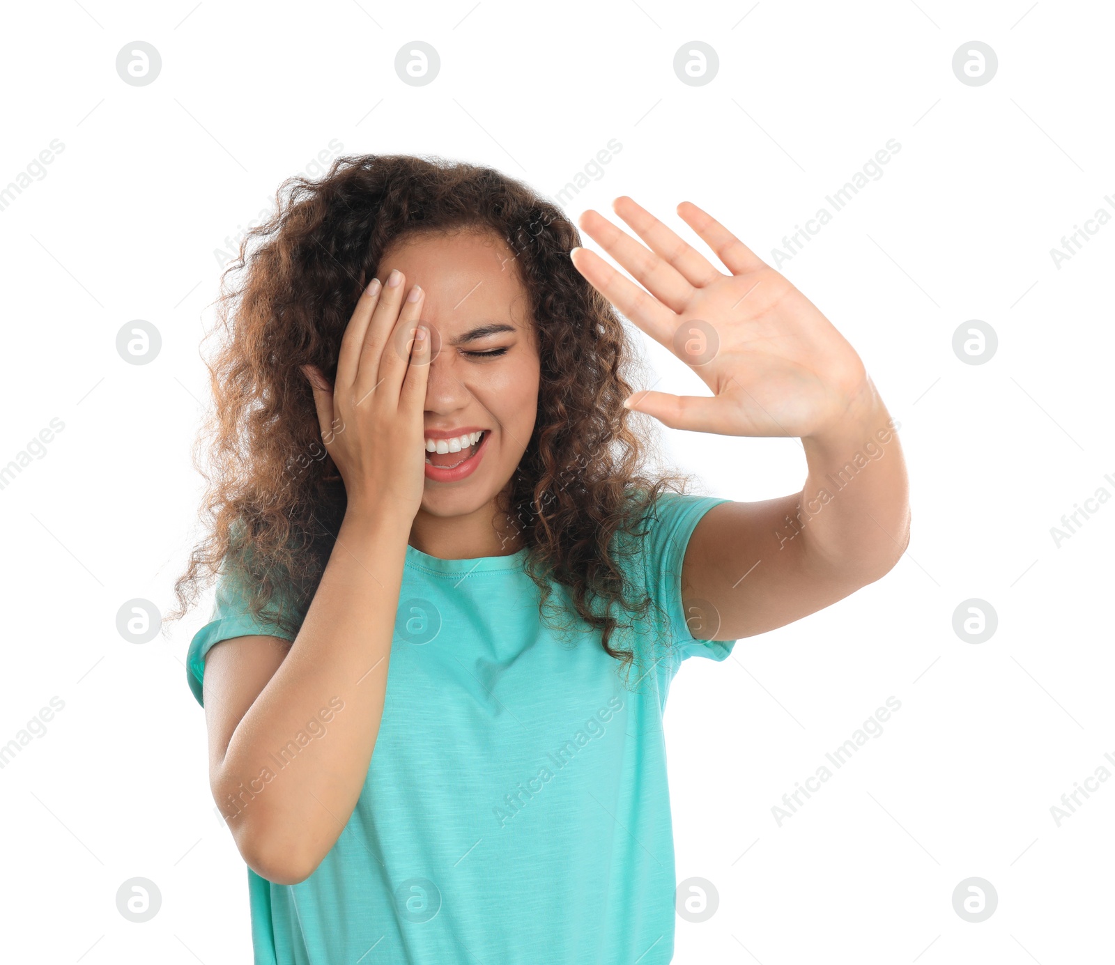 Photo of Young African-American woman being blinded on white background