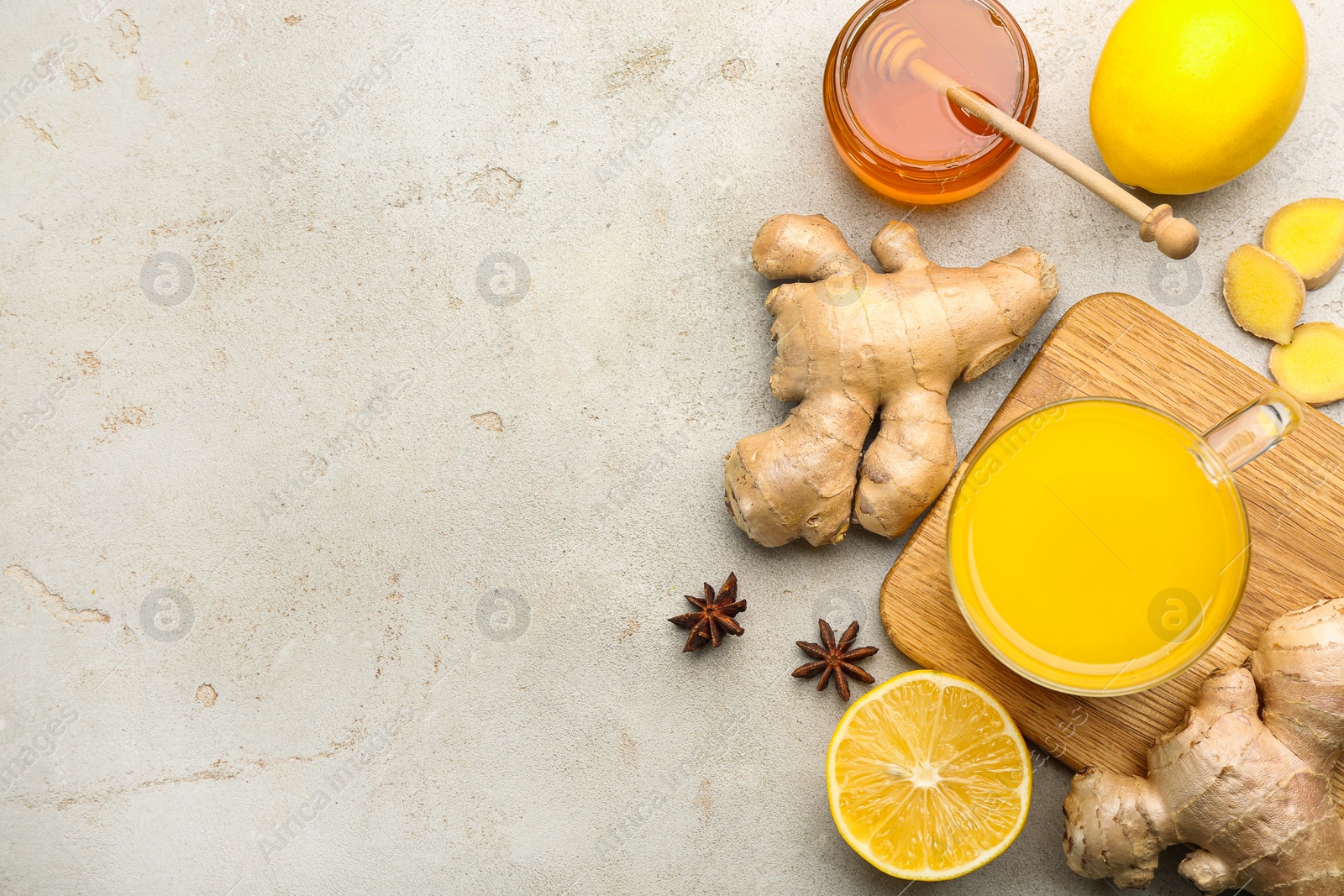 Photo of Flat lay composition with immunity boosting drink on light table. Space for text