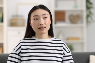 Portrait of beautiful confident businesswoman in office