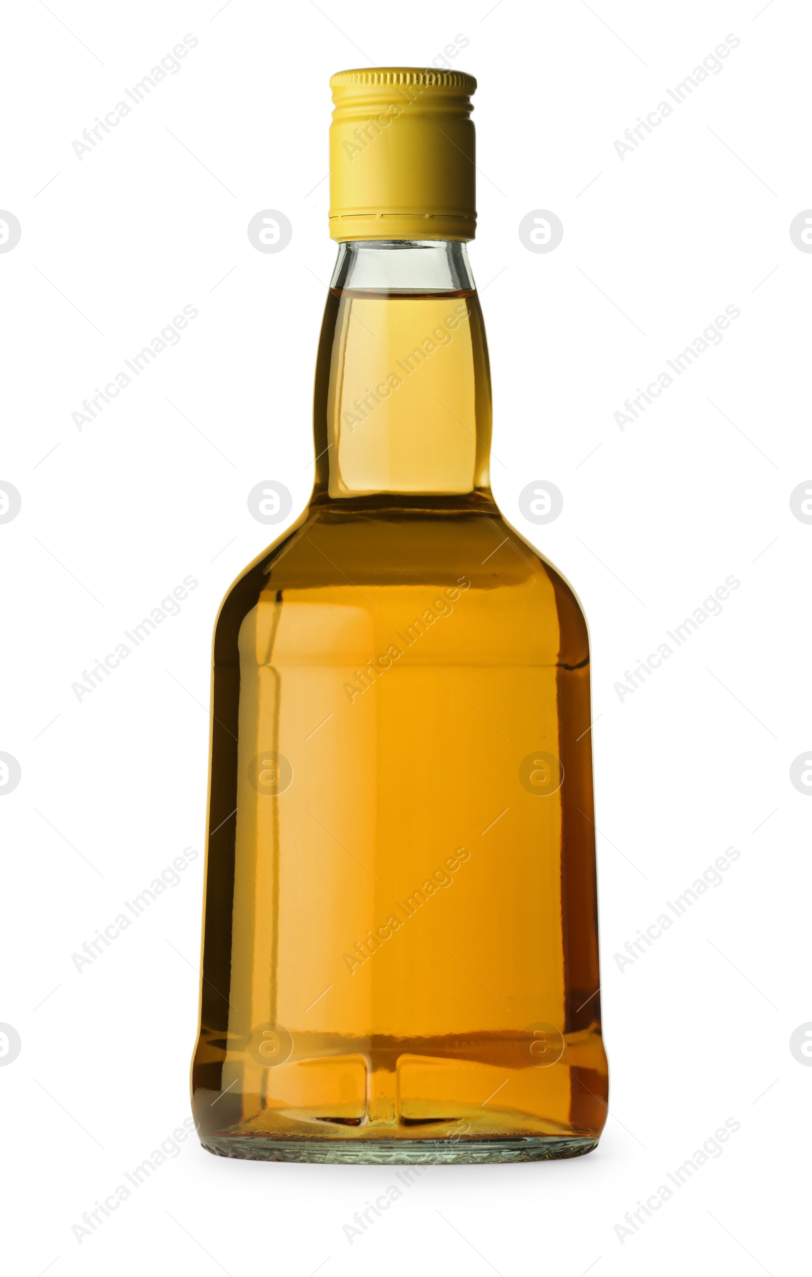 Photo of Whiskey in glass bottle isolated on white