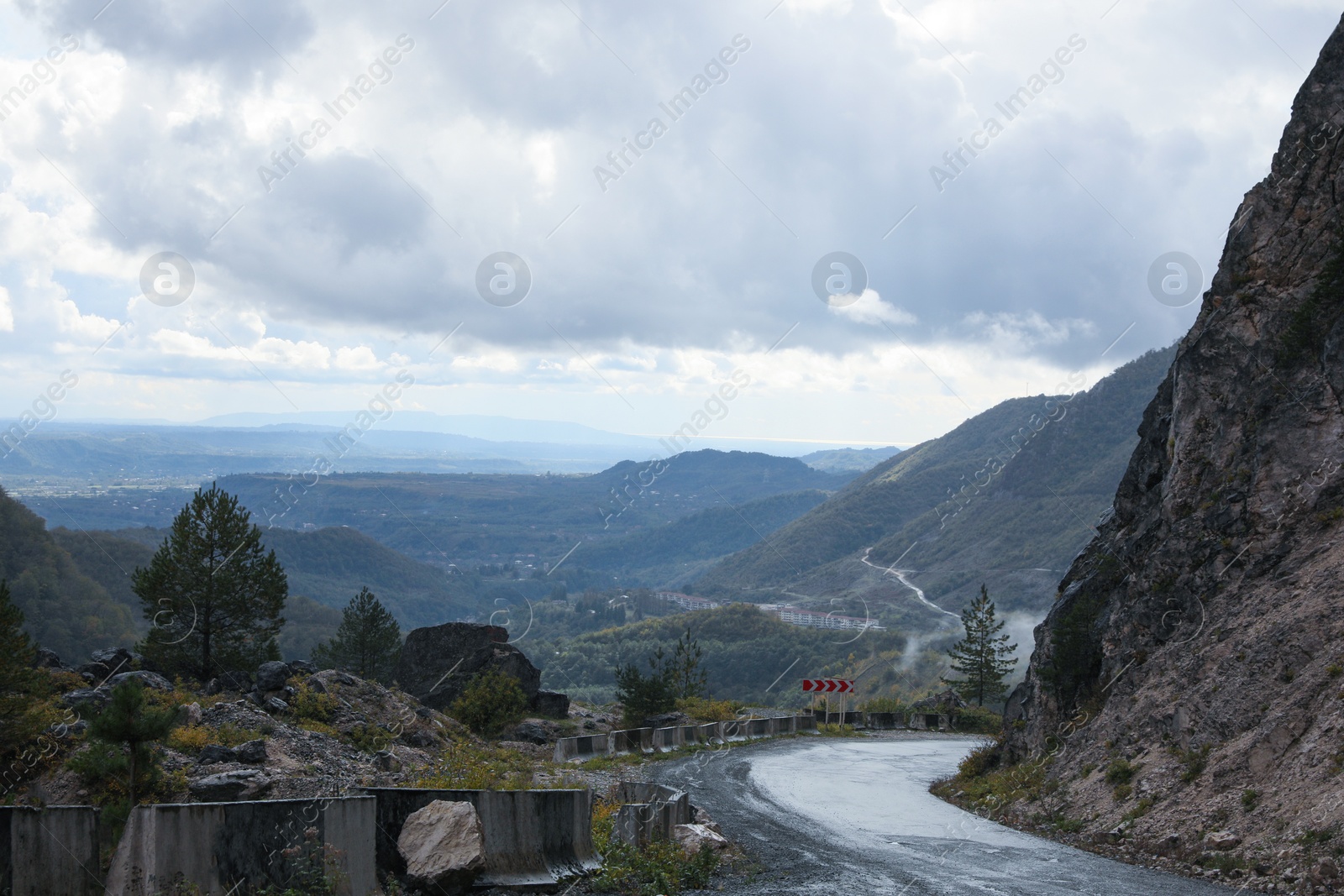 Photo of Picturesque view of empty road near mountains