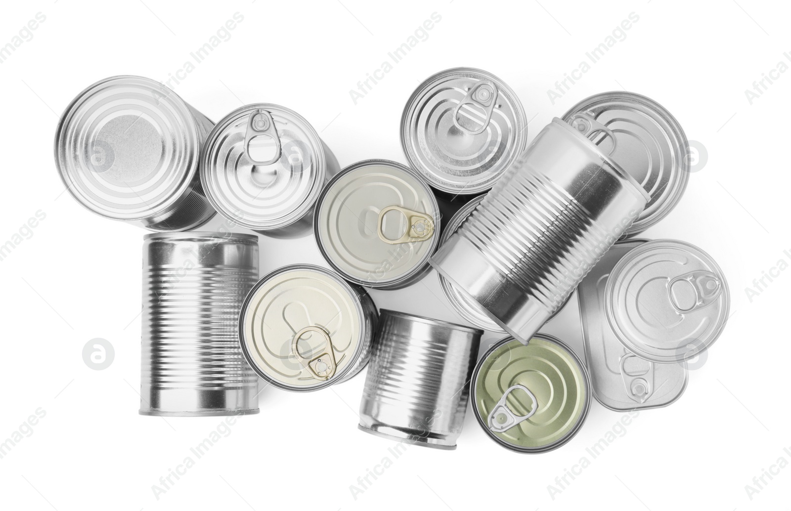 Photo of Many tin cans isolated on white, top view