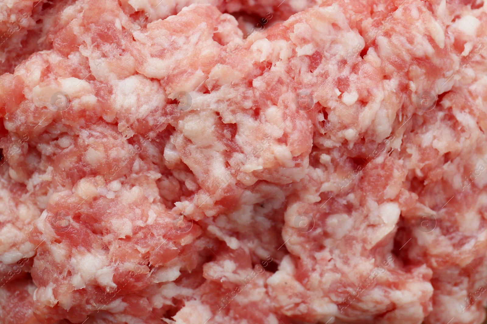 Photo of Raw fresh minced meat as background, closeup