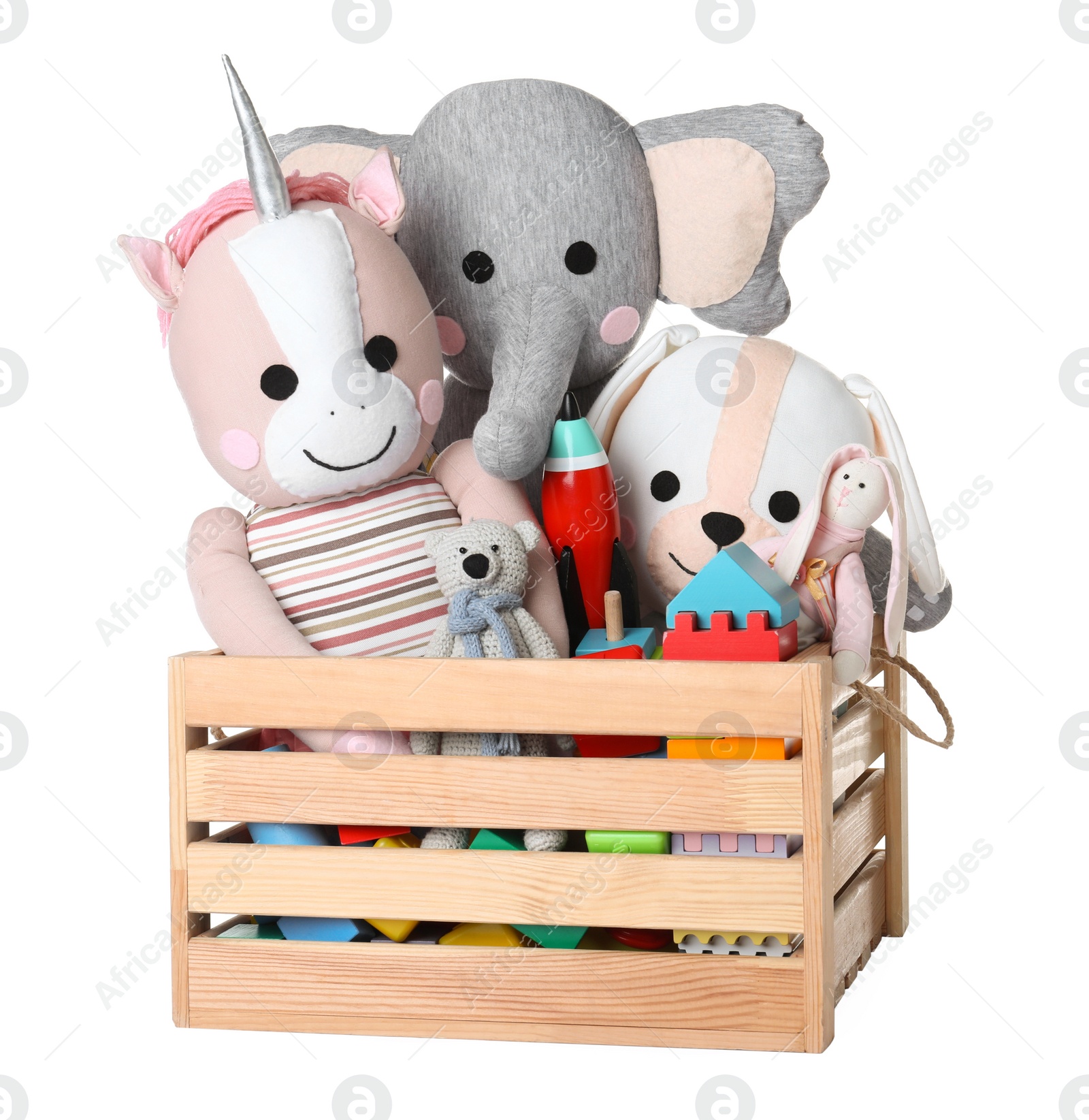 Photo of Wooden crate with different toys isolated on white