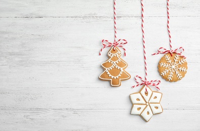 Photo of Tasty homemade Christmas cookies on wooden background