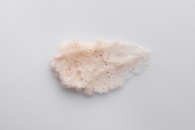 Photo of Sample of scrub on white background, top view