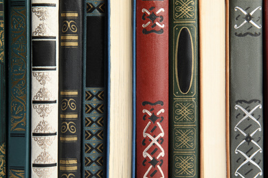 Photo of Collection of different old books as background