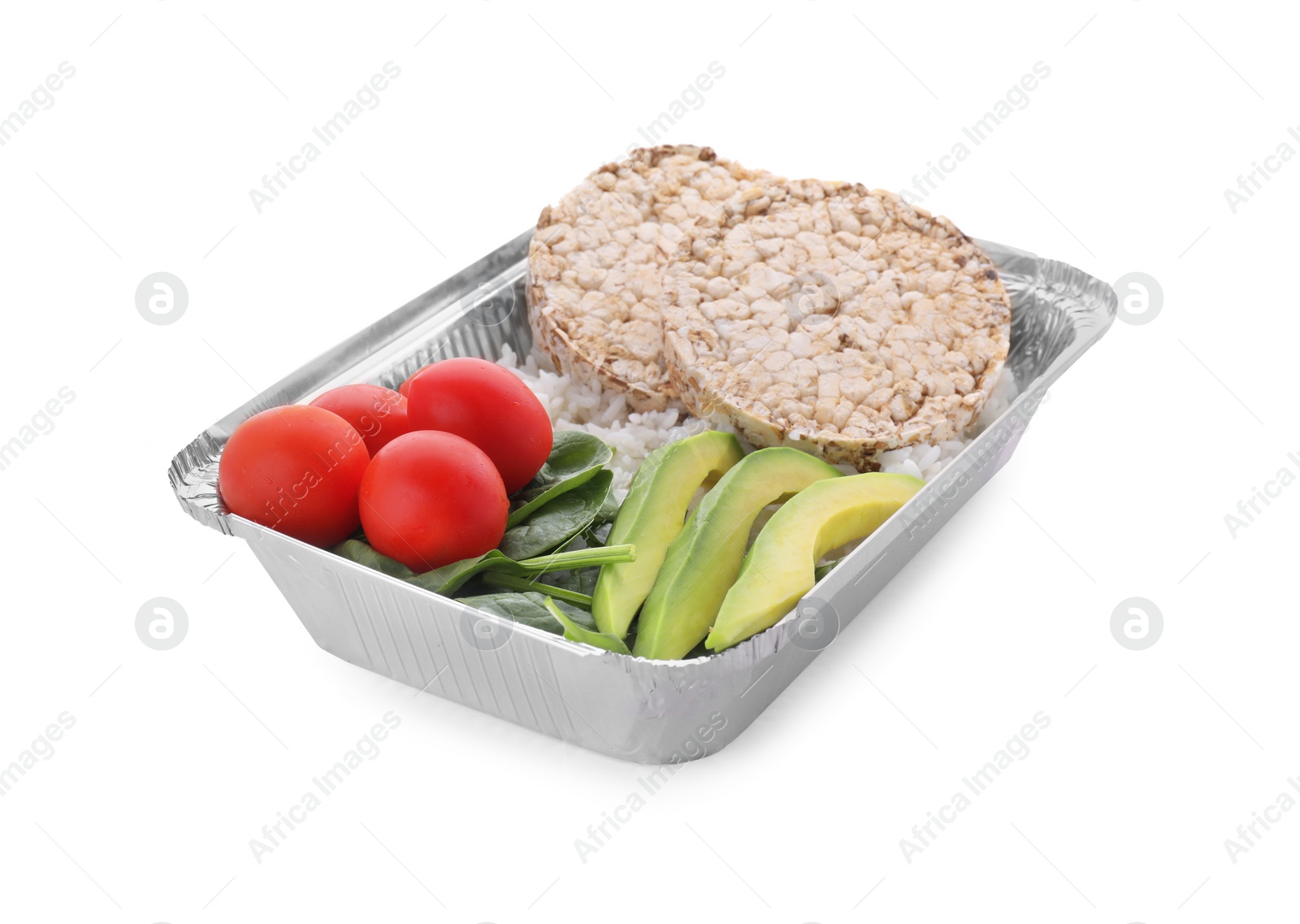 Photo of Container with rice, puffed cakes, fresh tomato, avocado and spinach isolated on white