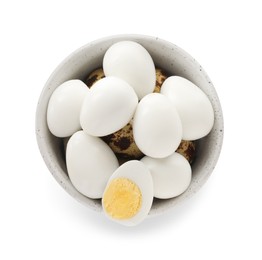 Unpeeled and peeled hard boiled quail eggs in bowl on white background, top view