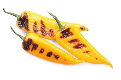 Photo of Tasty grilled yellow peppers isolated on white, top view