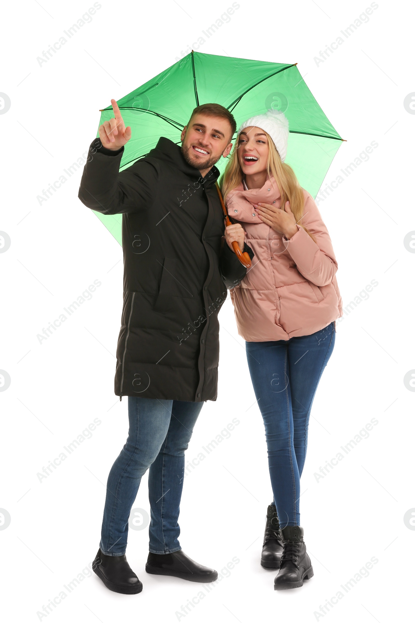 Photo of Full length portrait of beautiful couple with umbrella, isolated on white