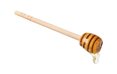 Photo of Natural honey dripping from dipper on white background