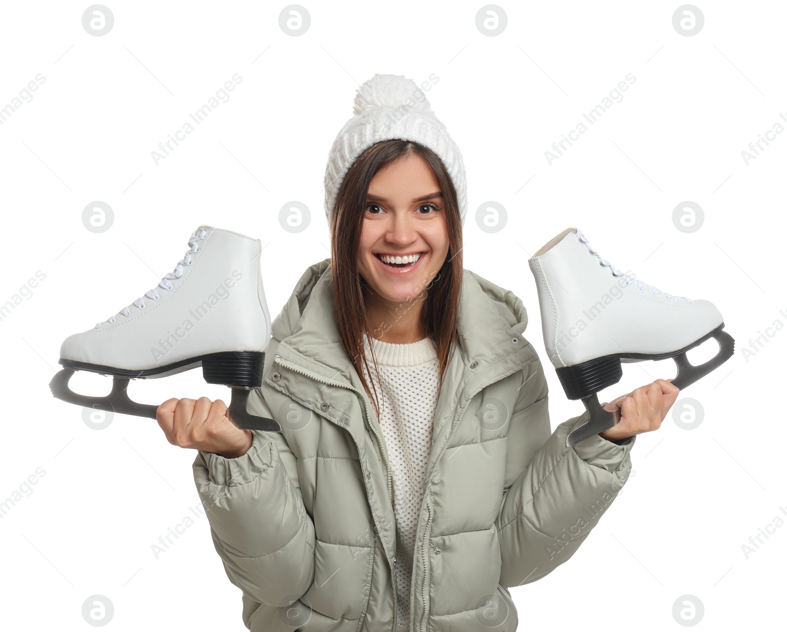 Photo of Happy woman with ice skates on white background