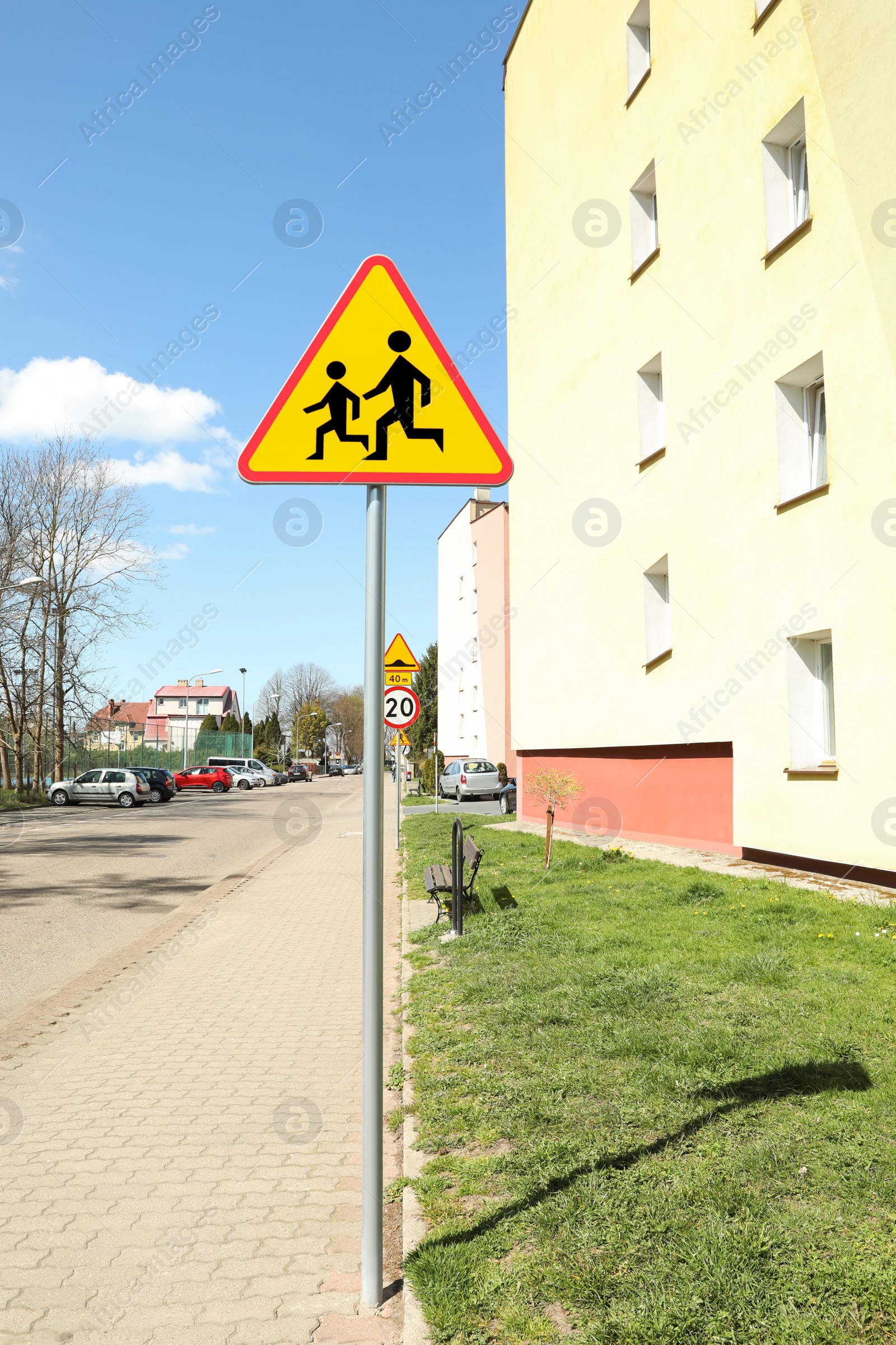 Photo of Traffic sign Children outdoors on sunny day