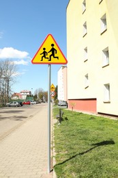 Photo of Traffic sign Children outdoors on sunny day