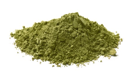 Photo of Heap of henna powder isolated on white