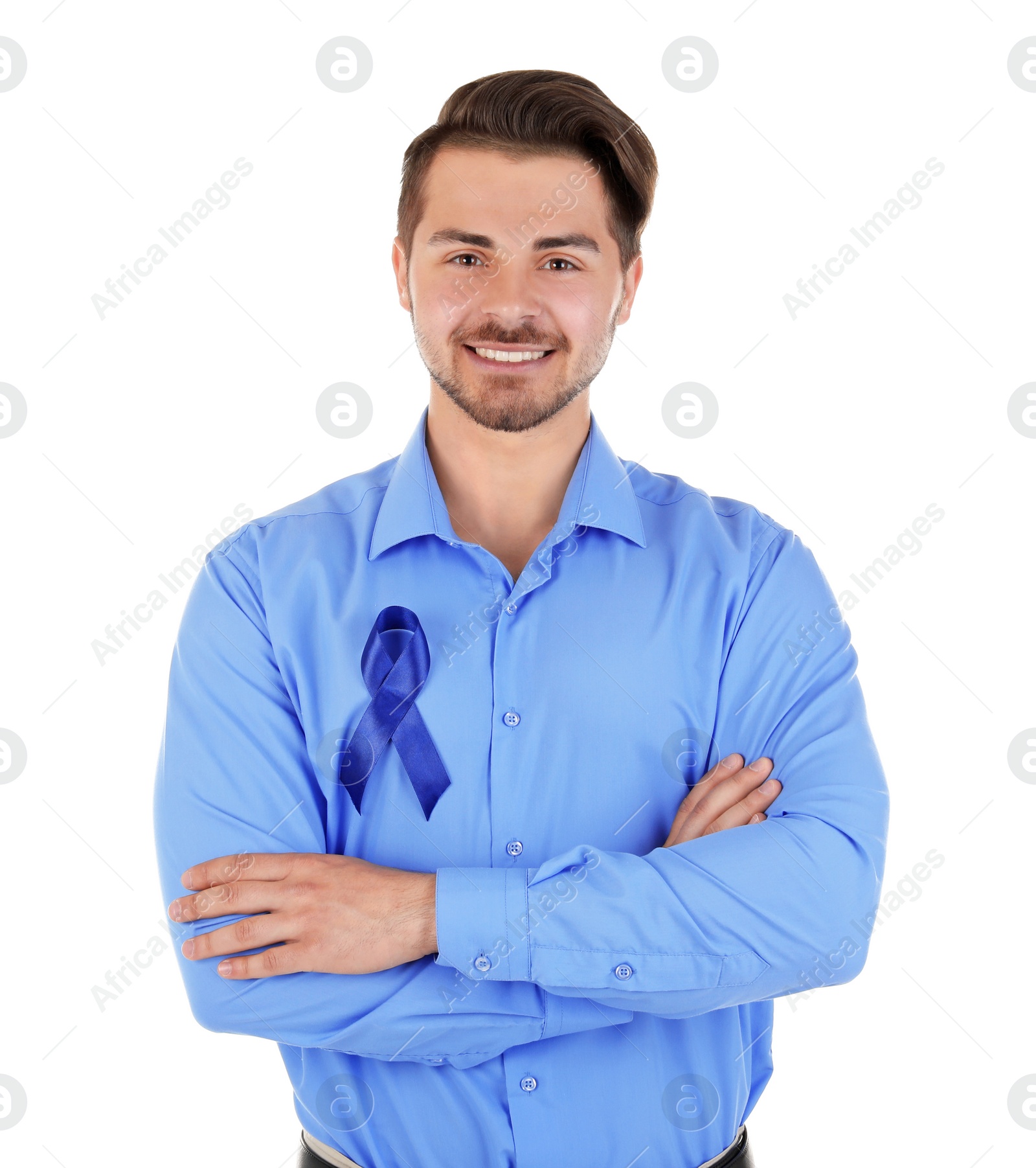 Photo of Young man with blue ribbon on white background. Urological cancer awareness