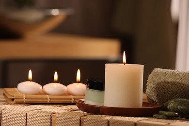 Photo of Beautiful composition with different spa products on wicker bench indoors