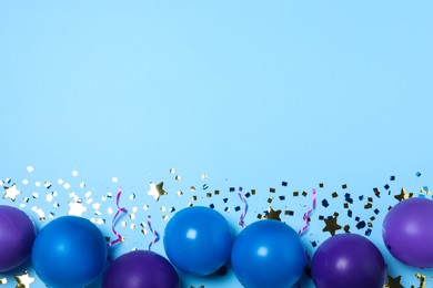 Photo of Many balloons and confetti on light blue background, flat lay with space for text. Birthday decor