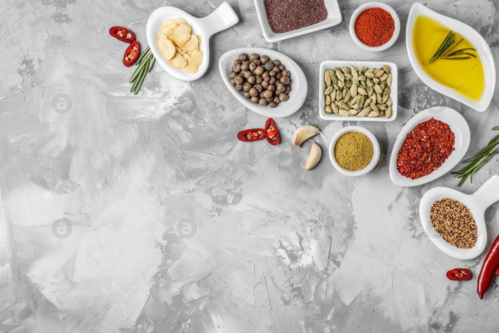 Photo of Flat lay composition with different aromatic spices and space for text on table