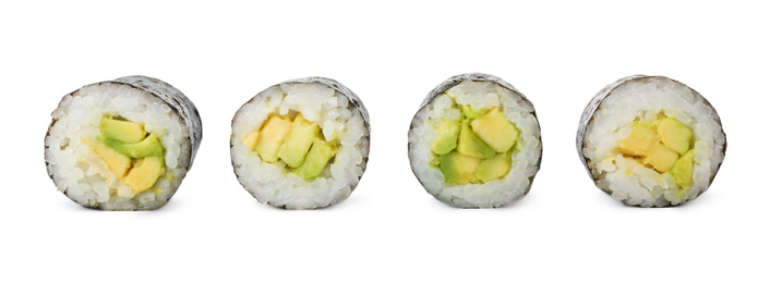 Photo of Delicious sushi rolls with avocado on white background
