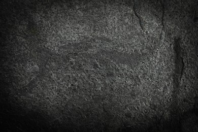 Image of Texture of dark grey stone surface as background, closeup