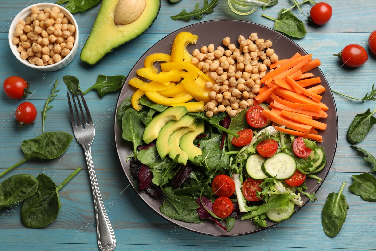 Photo of Balanced diet and vegetarian foods. Plate with different delicious products on table, flat lay