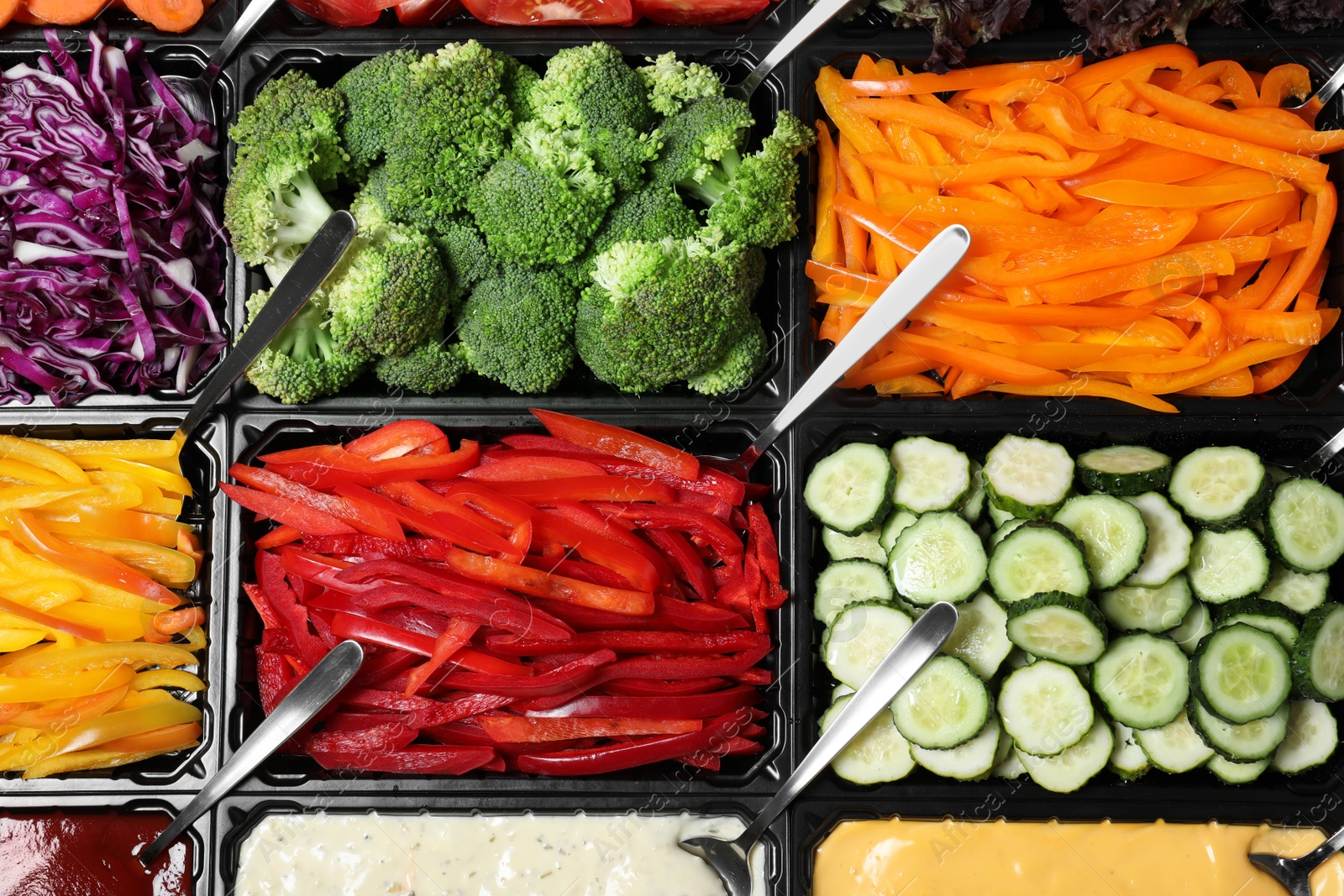 Photo of Salad bar with different fresh ingredients as background, top view