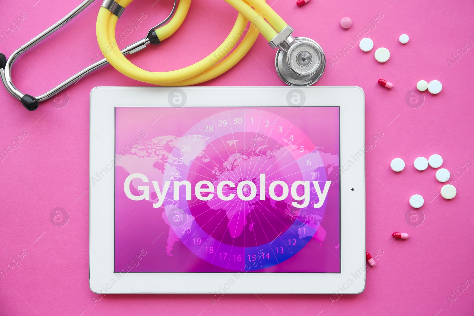 Photo of Flat lay composition with stethoscope, tablet and pills on color background. Gynecological checkup