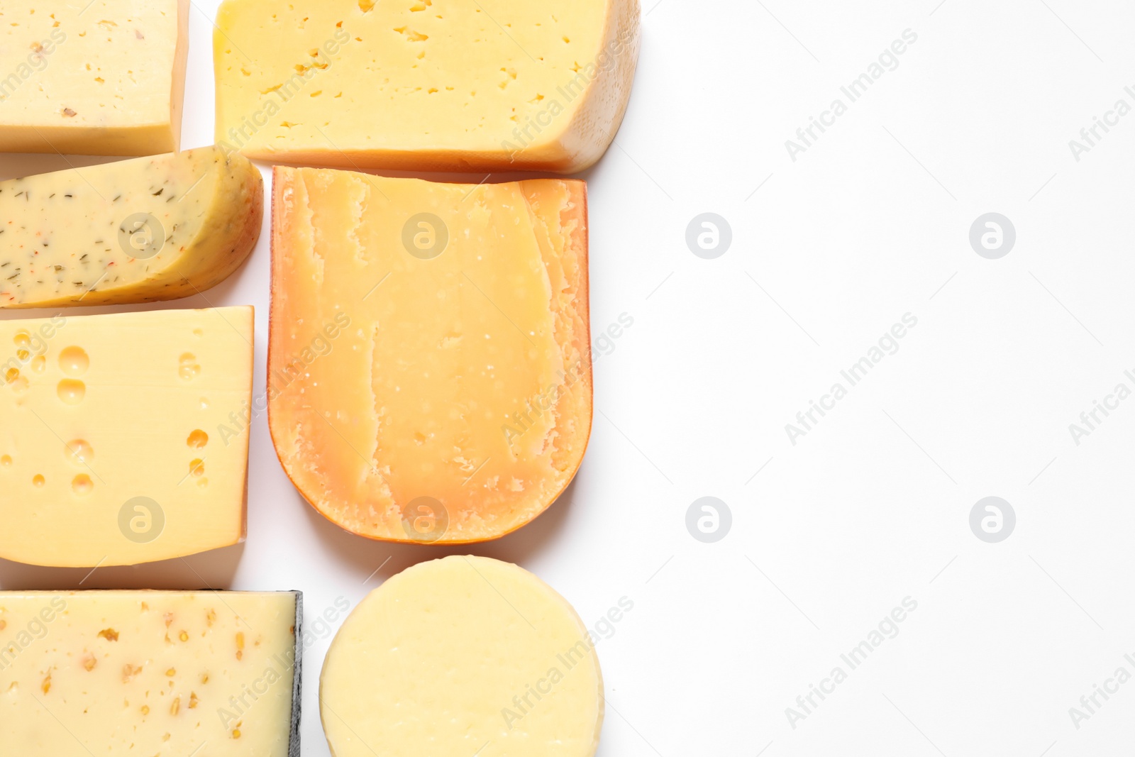 Photo of Composition with different kinds of tasty cheese on white background, top view