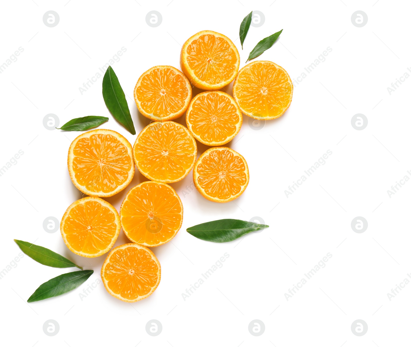 Photo of Composition with halves of fresh ripe tangerines and leaves on white background, top view. Citrus fruit