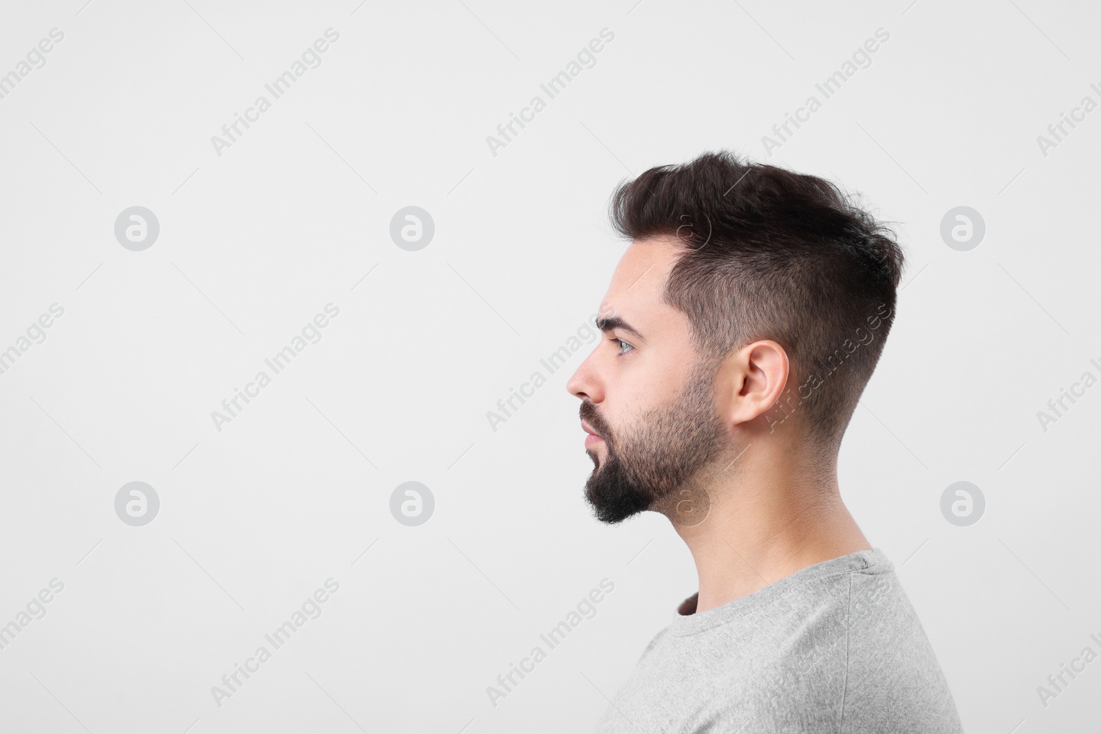 Photo of Man with healthy hair on light grey background, space for text