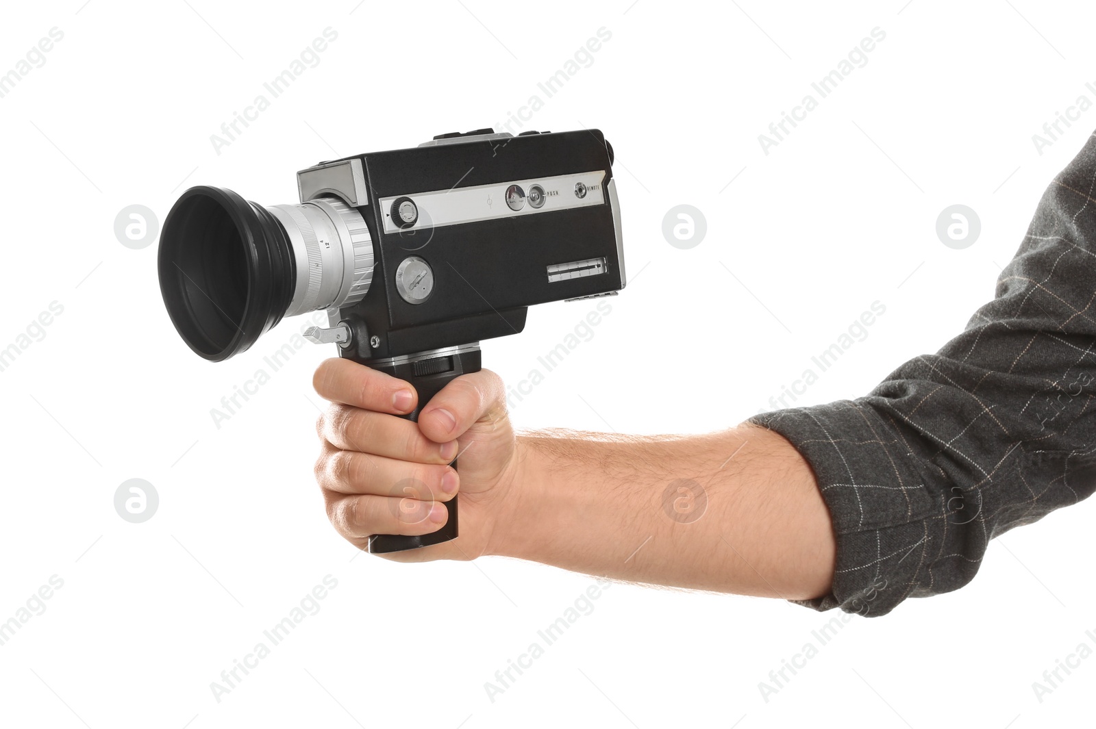 Photo of Man with vintage video camera on white background, closeup of hand