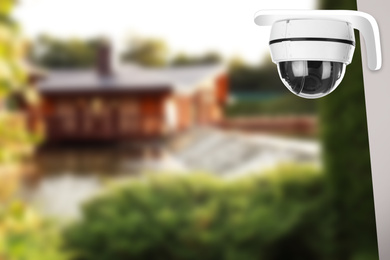 Home security system. House under CCTV camera surveillance