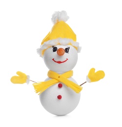 Photo of Decorative snowman with yellow hat, scarf and mittens isolated on white