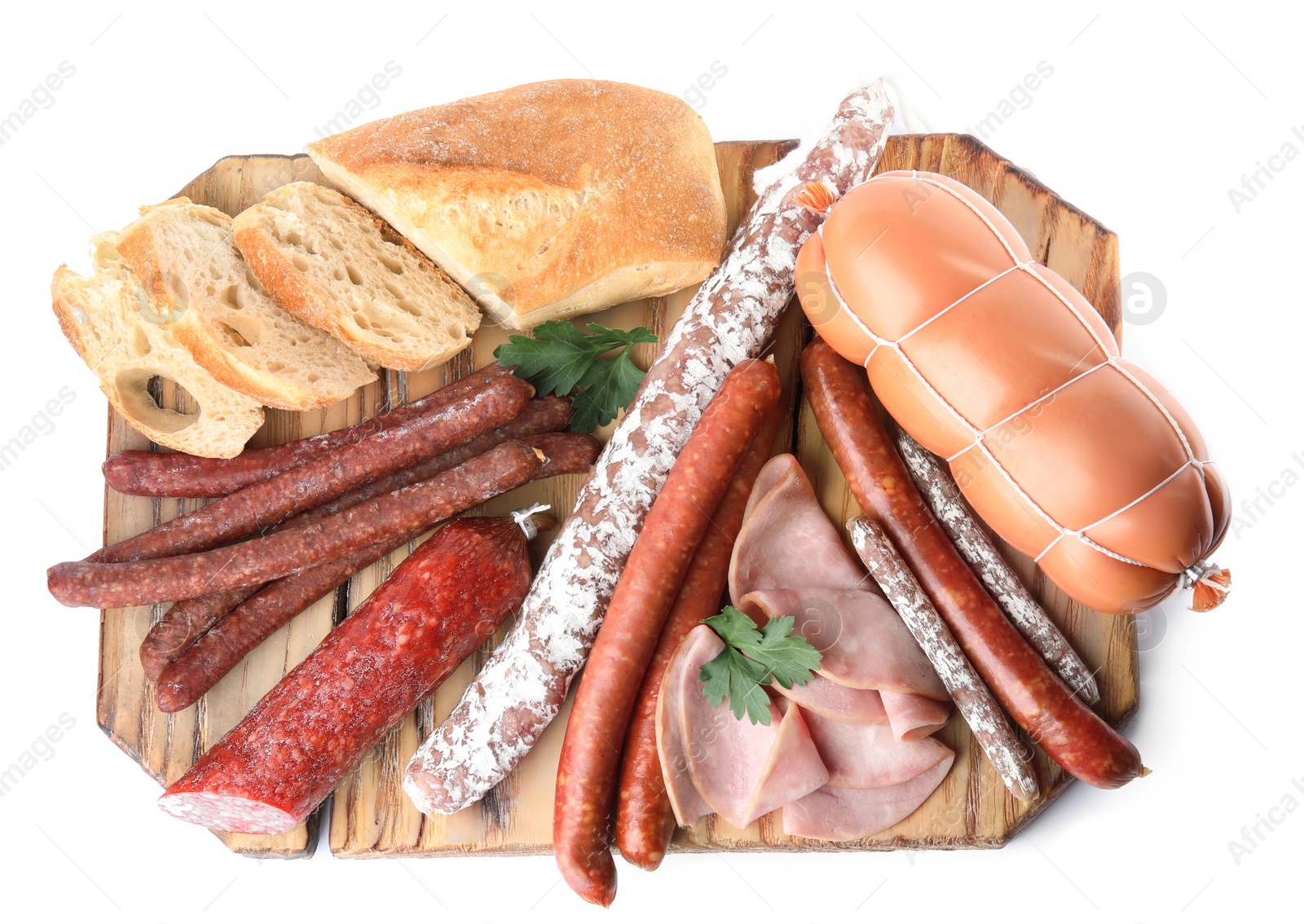 Photo of Wooden board with different tasty sausages isolated on white, top view