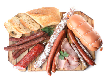 Wooden board with different tasty sausages isolated on white, top view