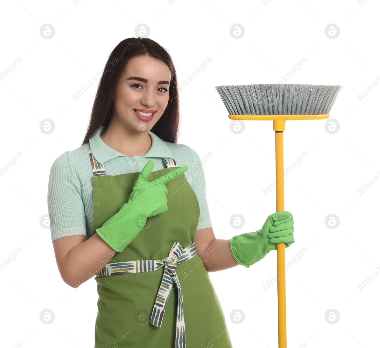 Photo of Beautiful young woman with broom on white background