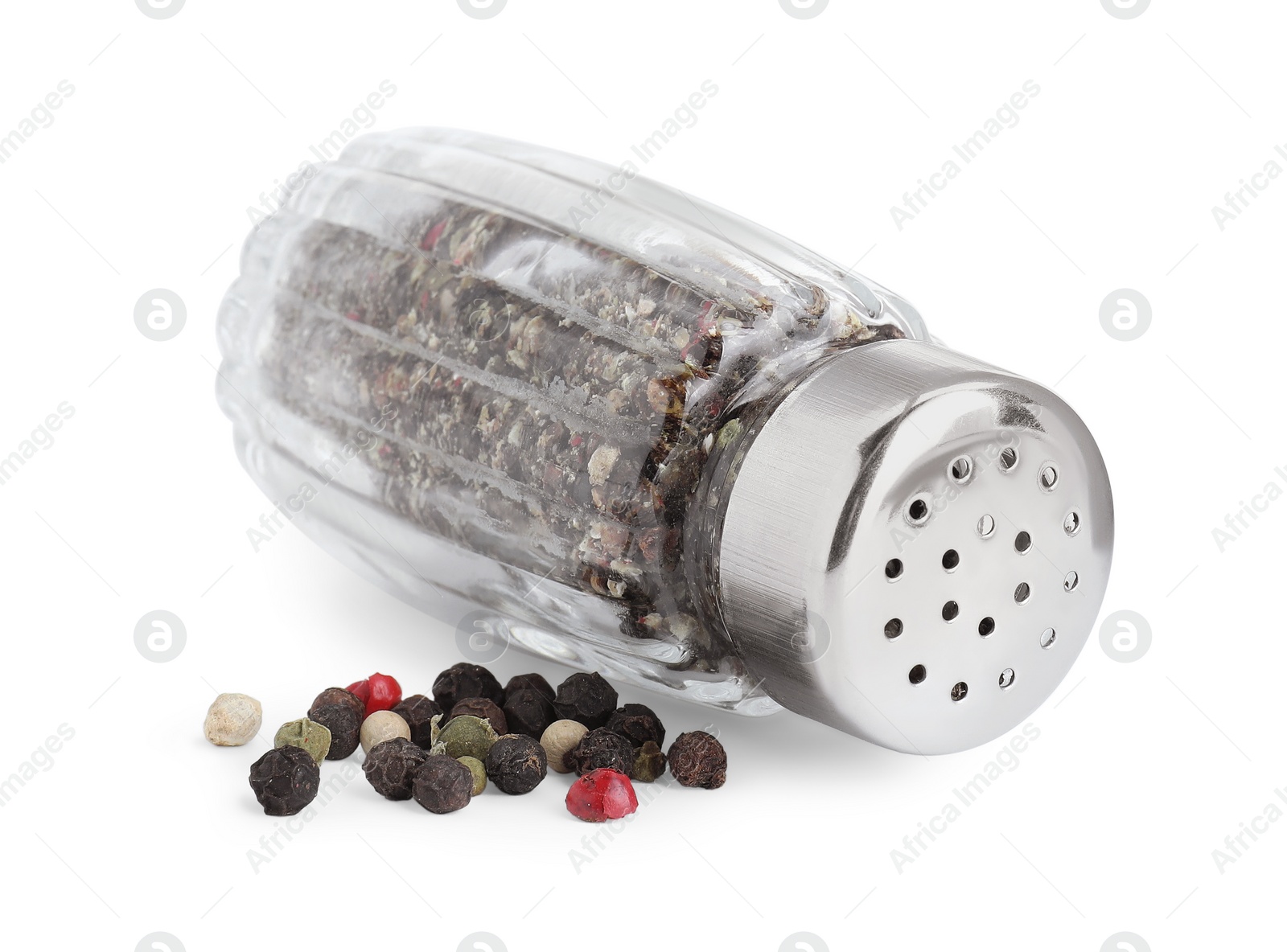 Photo of Glass shaker with pepper isolated on white