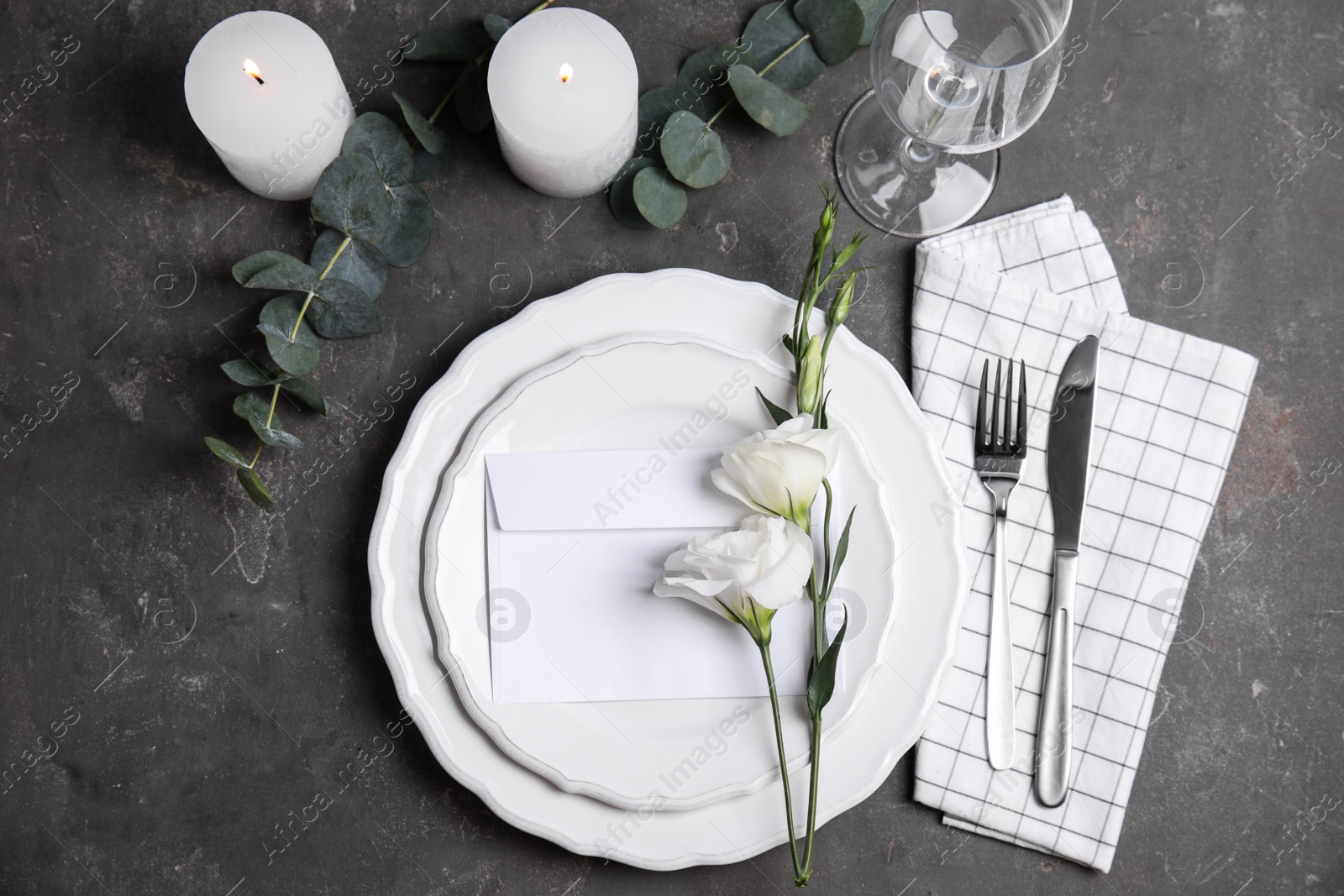 Photo of Elegant festive table setting on dark grey background, flat lay